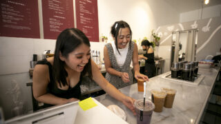 Sashaline and Shasitie Nguyen prep drinks behind the bar at Ti Cafe on South Broadway. June 24, 2023.
