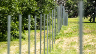 Precursors to a new fence around the Park Hill Golf Course. June 27, 2023.