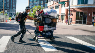 Residents of a homeless encampment centered around 22nd and Stout streets in Denver packed up and carted away their lives Friday morning, August 4, 2023, as the City of Denver began to clear the area ahead of a cleanup.