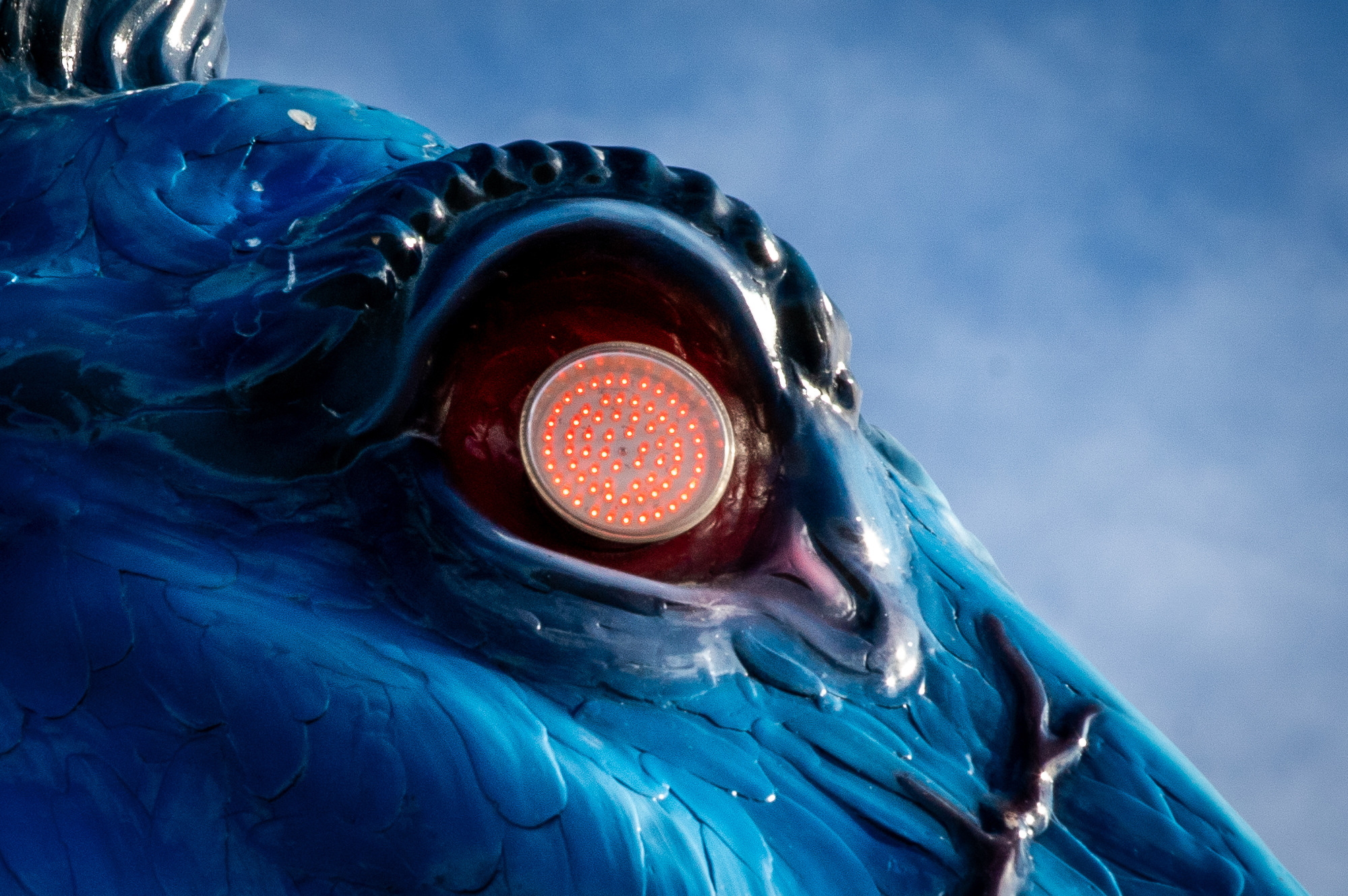 Who keeps Blucifer’s eyes red and blue body shining?